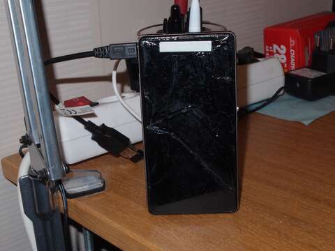 Xperia with cracked, glued screen and OTG cable now required for interfacing with it